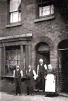 Alexander and Matilda Georgina Reeves outside their house at 67 Clark Street, Ladywood.jpg