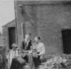 Jimmy Satterthaite and Dicky, brewhouse and communal tiolet in back ground.jpg