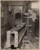 Working a hand press of some sort.jpg