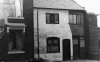 12 and 13 Oldbury Road.No 13 Smallest house in Smethwick 4feet 10inches at front..jpg